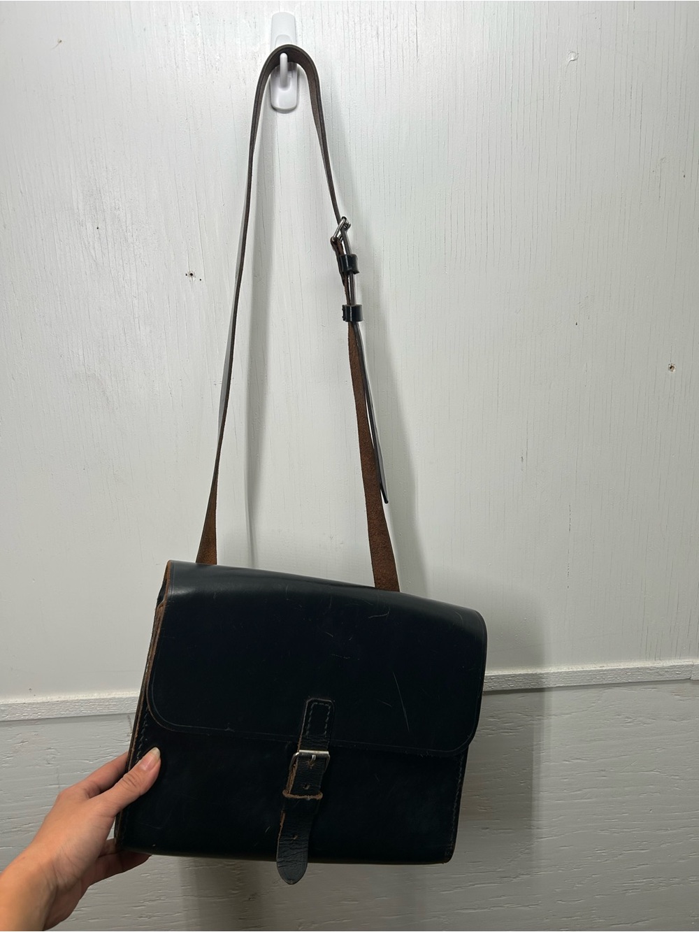 Classic Black Leather Messenger Bag with Brown Strap